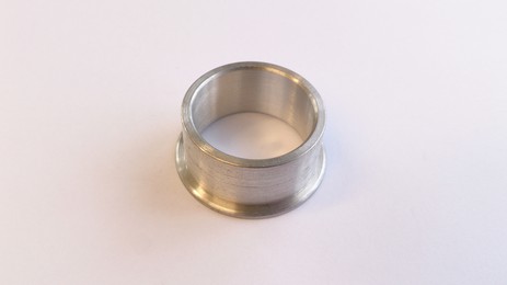 Aluminium spark plug surround